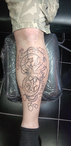 Explore tattoo ideas for women's legs, creative tattoo ideas in Apple Valley, available at Klassic tattoo