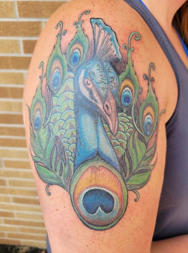 Explore paisley tattoo ideas, creative tattoo ideas in Waterloo, available at Friki Tiki Tattoo and Gallery