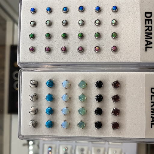 Explore cover up tattoo ideas on hand, creative tattoo ideas in Mc Kees Rocks, available at Exile Ink