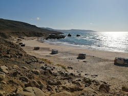 Marsa Douiba'in fotoğrafı dağlarla çevrili