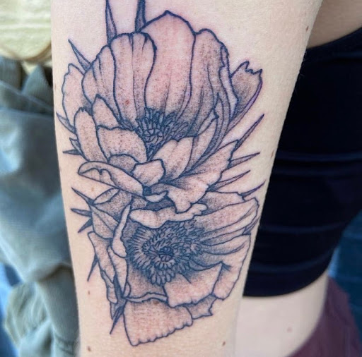 Explore cool upper arm tattoo ideas, creative tattoo ideas in Boulder, available at Claw and Talon Tattoo