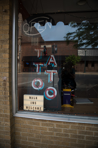 Explore coldplay tattoo ideas, creative tattoo ideas in Cedar Falls, available at Red Owl Tattoo