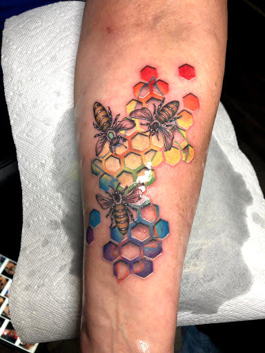Explore spine tattoo ideas for females, creative tattoo ideas in Kingsford, available at Deft Tattoo Studio