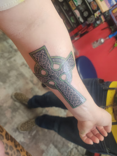 Explore dahlia tattoo ideas, creative tattoo ideas in Madisonville, available at Mainstream Body Art