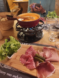 Raclette du Restaurant français Le Chalet Gourmand à Cluses - n°2