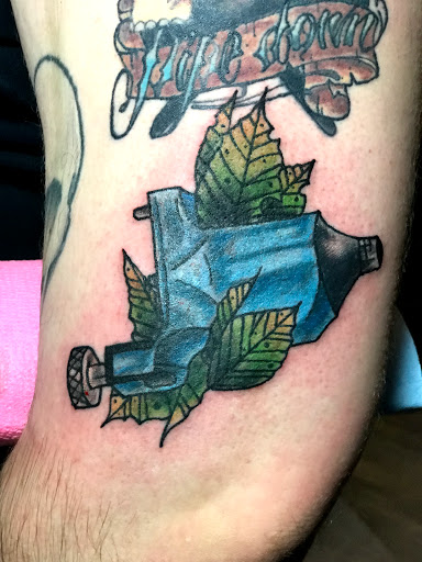 Explore grease tattoo ideas, creative tattoo ideas in Jonesboro, available at Gallery Of Ink Tattoo Shop