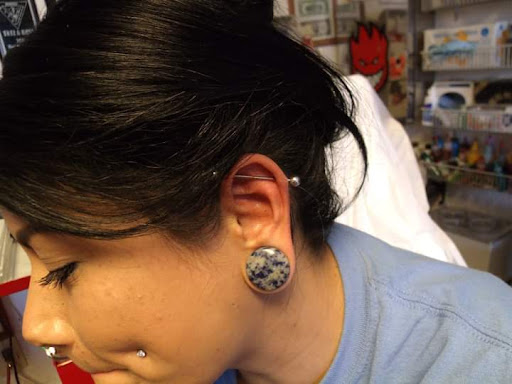 Explore shoe tattoo ideas, creative tattoo ideas in Elko, available at Custom Tattoos and Body Piercing Studio