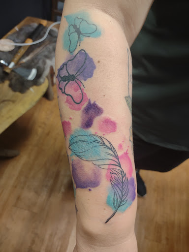 Explore tattoo ideas for outdoorsmen, creative tattoo ideas in Williamston, available at Inkd Tattoo Parlor