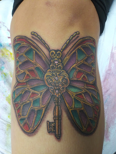 Explore lioness tattoo ideas, creative tattoo ideas in Buford, available at Inked Arts Tattoo Studio