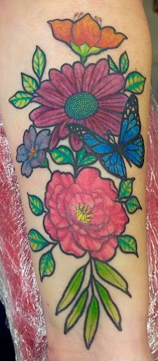 Explore back forearm tattoo ideas, creative tattoo ideas in Rowlett, available at Fresh Image Tattoo Studios