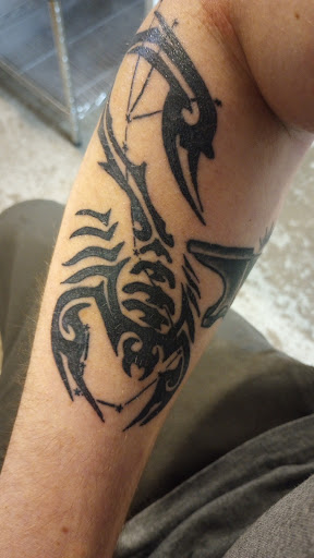 Explore cool walk in tattoo ideas, creative tattoo ideas in Minocqua, available at Black Sheep Ink