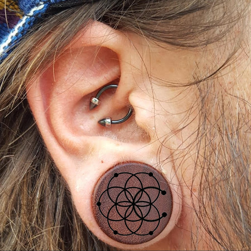 Explore tattoo ideas to represent your child, creative tattoo ideas in Sarasota, available at Z-Edge Tattoo & Body Piercing South Shop