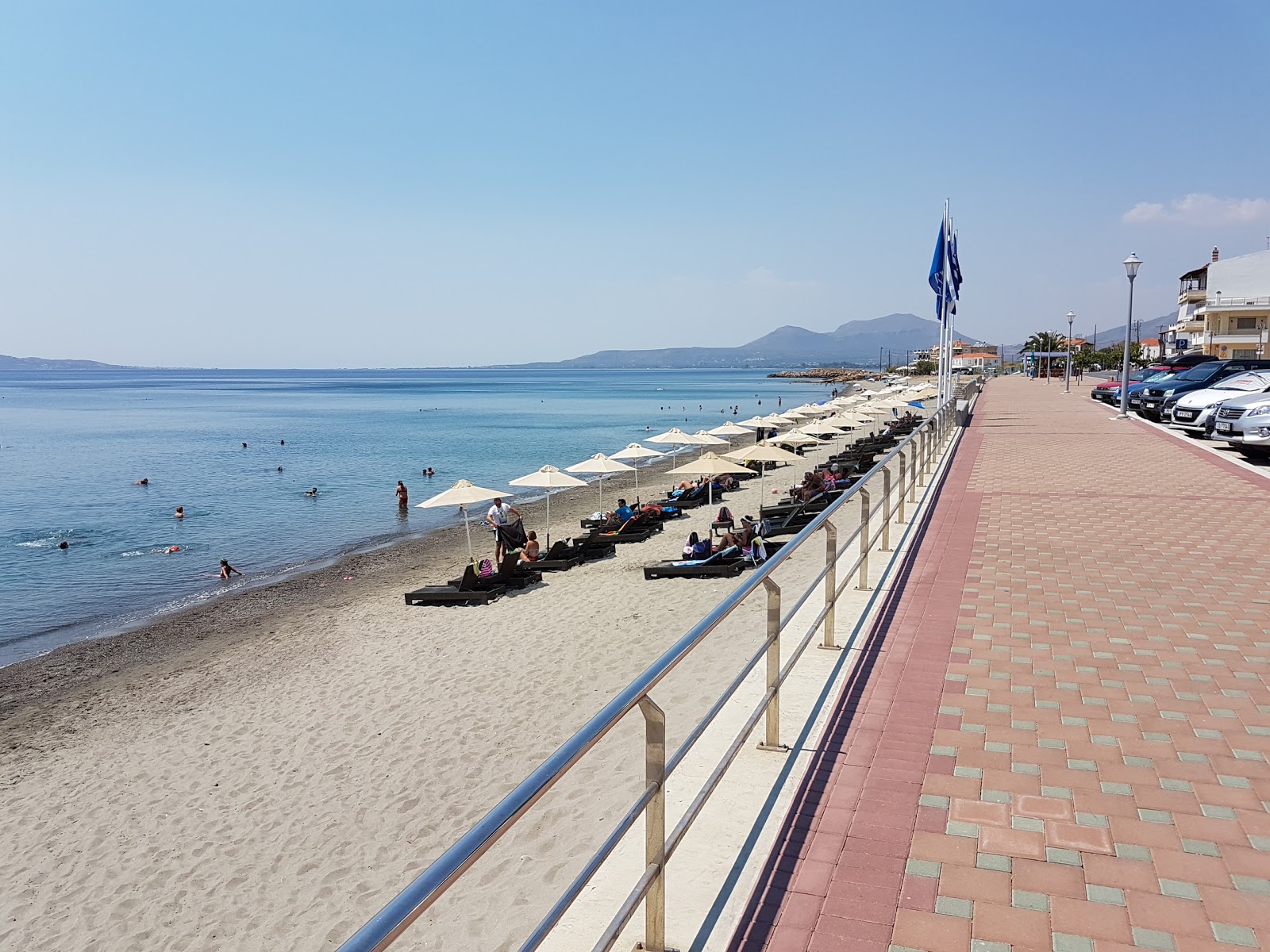 Fotografija Neapolis beach z svetel pesek površino