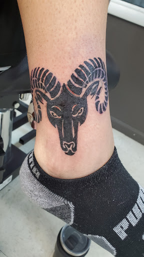 Explore name face tattoo ideas, creative tattoo ideas in Fort Mohave, available at RedRum Tattoo & Body Piercing Co.