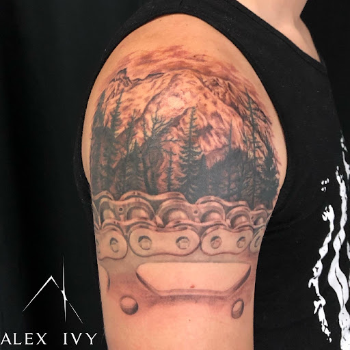 Explore red ink tattoo ideas for guys, creative tattoo ideas in Kent, available at Ivy Ink Tattoo