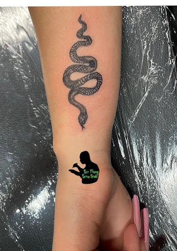 Explore armband tattoo ideas for men, creative tattoo ideas in El Monte, available at Tatt Thang Tattoo Studio
