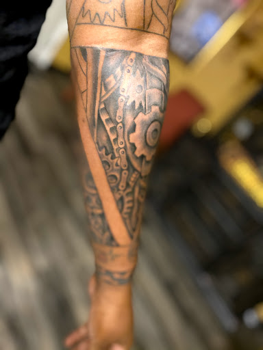 Explore female stomach tattoo ideas, creative tattoo ideas in Warner Robins, available at Untold Pain Tattoo Studio