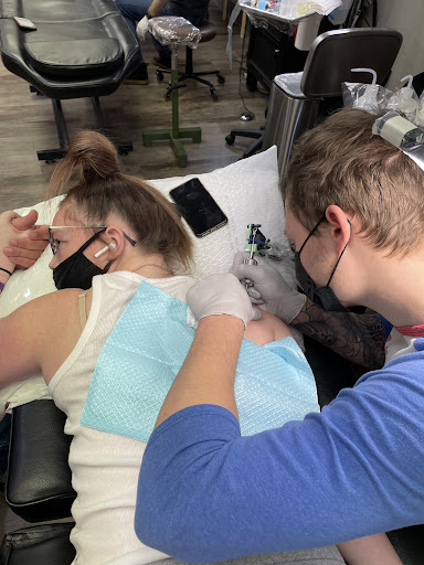 Explore family portrait tattoo ideas, creative tattoo ideas in Omaha, available at Ironwood Ink