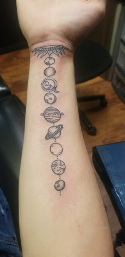 Explore dark knight tattoo ideas, creative tattoo ideas in Monroe, available at Vivid Art Tattoos