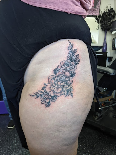 Explore feminine horse tattoo ideas, creative tattoo ideas in Slippery Rock, available at Dinky Dachshund Tattoo Parlor
