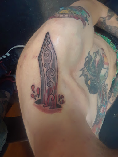 Explore leg sleeve tattoo ideas for men, creative tattoo ideas in Jacksonville, available at Erics Tattoos