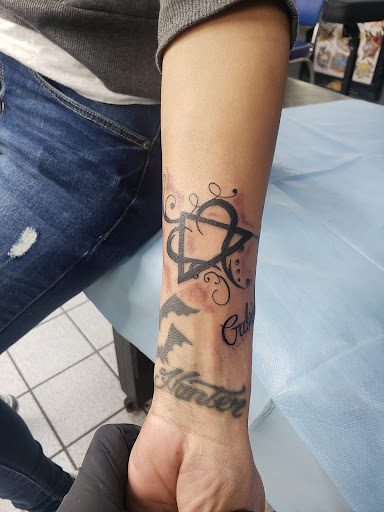 Explore adam and eve tattoo ideas, creative tattoo ideas in Houston, available at 333 Tattoo Studio HTX