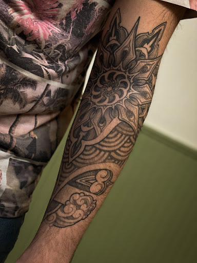 Explore snoopy tattoo ideas, creative tattoo ideas in Hudson, available at The Bohemian Social Club