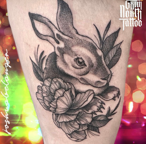 Explore tattoo ideas for upper arm, creative tattoo ideas in Portsmouth, available at Grim North Tattoo and Piercing