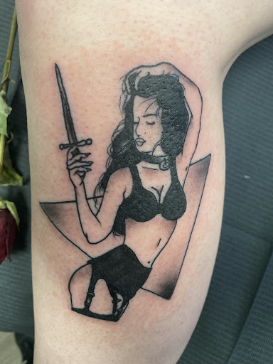 Explore back arm tattoo ideas, creative tattoo ideas in Buffalo, available at True Gloom Tattoo Studio