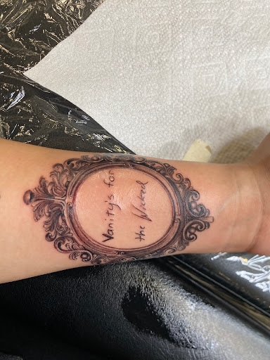 Explore floral tattoo ideas for females, creative tattoo ideas in Duncanville, available at Studio Fourteen Tattoos