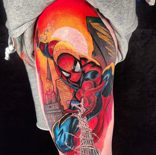 Explore tattoo ideas for womens thigh, creative tattoo ideas in Buford, available at Inked Arts Tattoo Studio
