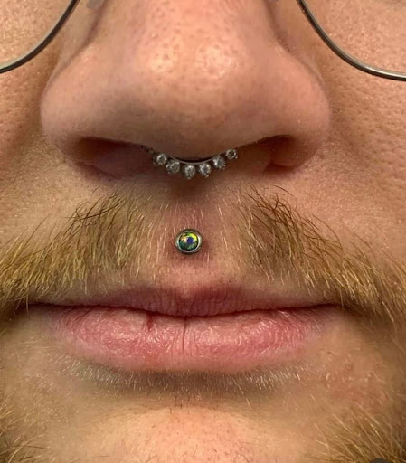 Explore blackout tattoo ideas, creative tattoo ideas in Fairfax, available at Comes A Time Tattoo