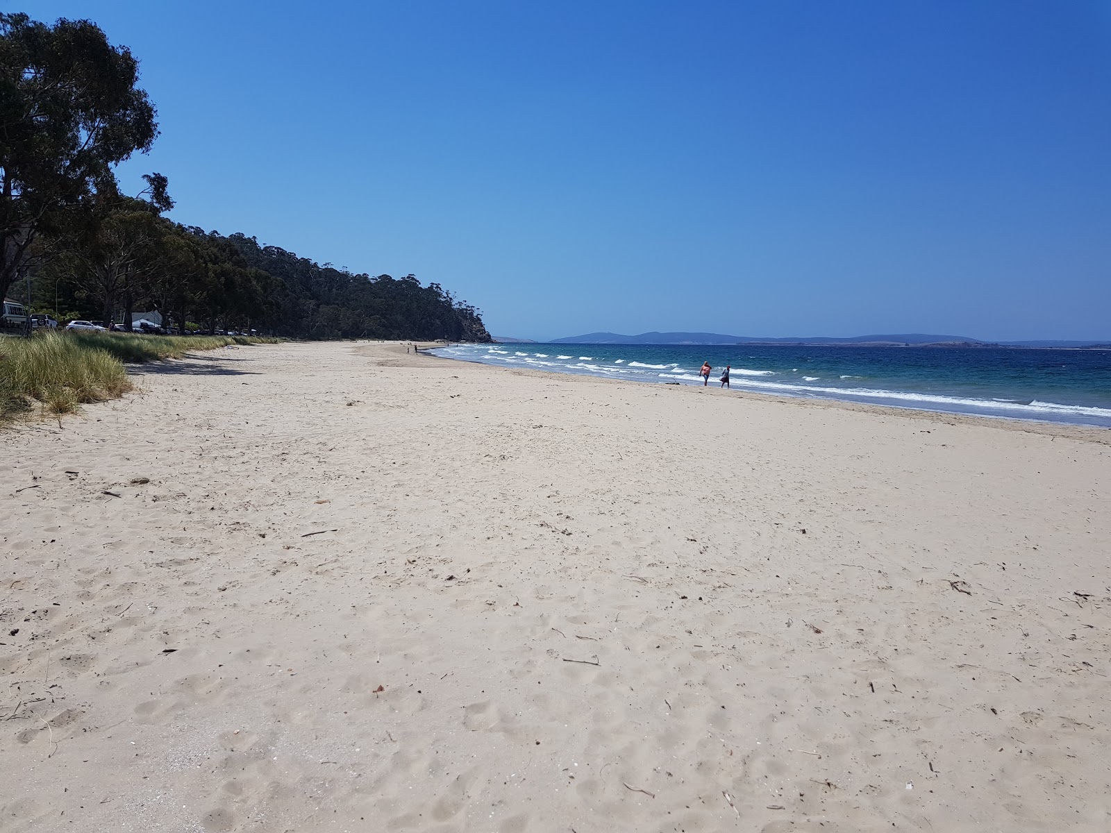 Foto de Kingston Beach con arena beige superficie