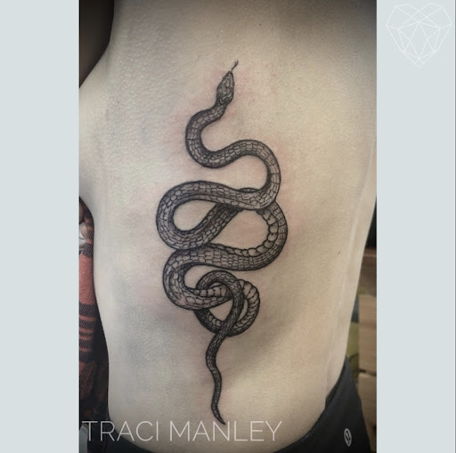 Find tattoo ideas with letters for your next unique tattoo in Spokane at Moms Custom Tattoo & Body Piercing