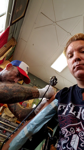 Explore reaper tattoo ideas, creative tattoo ideas in New Orleans, available at Downtown Tattoos and Piercing