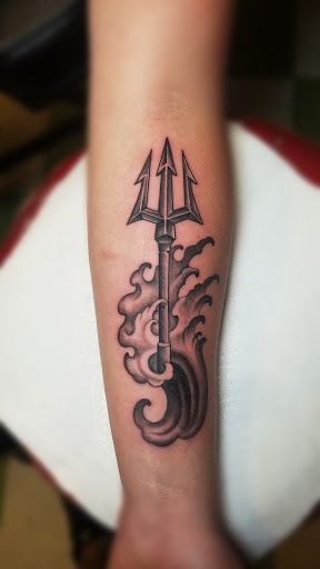 Explore marriage ring tattoo ideas, creative tattoo ideas in Lake, available at Soul Rebel Tattoo