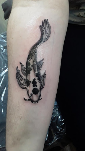Explore tattoo ideas for breast cancer ribbon, creative tattoo ideas in Anniston, available at Ink Therapy LLC Tattoo Studio
