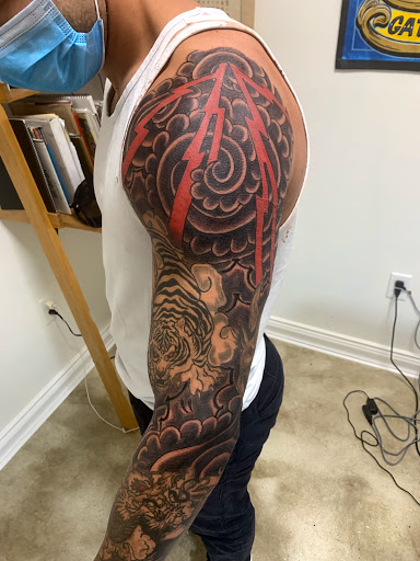 Explore men small tattoo ideas, creative tattoo ideas in Miami, available at Bonsai Mike Tattoos