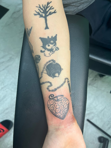 Explore arm tattoo ideas for women, creative tattoo ideas in Warner Robins, available at Pen & Portrait Tattoos