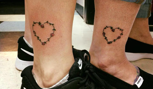 Explore dirt bike tattoos ideas, creative tattoo ideas in Milwaukee, available at Bay Street Tattoo Co.