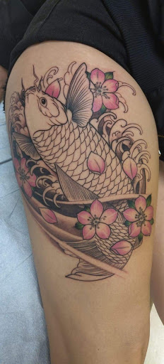 Explore barbed wire tattoo cover up ideas, creative tattoo ideas in Mcallen, available at World Famous La Mancha Tattooz