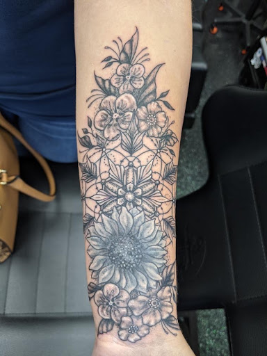 Explore twin tattoo ideas for mom, creative tattoo ideas in Slippery Rock, available at Dinky Dachshund Tattoo Parlor