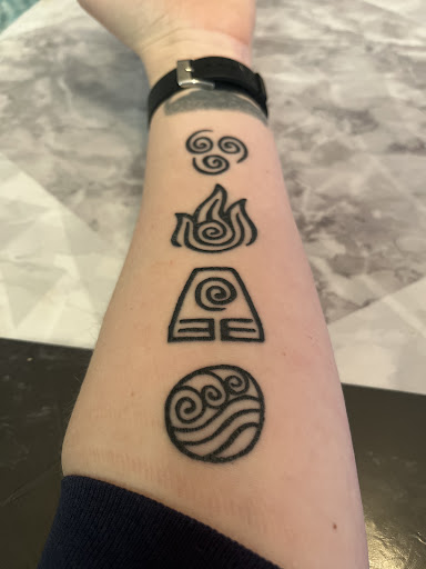 Find tattoo ideas moon and sun for your next unique tattoo in Ann Arbor at Spiral Tattoo