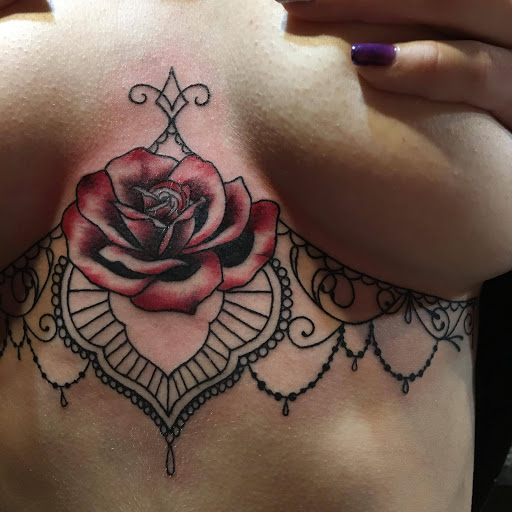 Explore neck tattoos for men ideas, creative tattoo ideas in Sioux Falls, available at Permanent Addictions