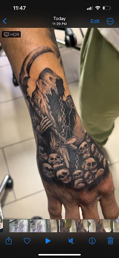 Explore cat and dog tattoo ideas, creative tattoo ideas in Sarasota, available at SEVEN SINS Tattoo Studio