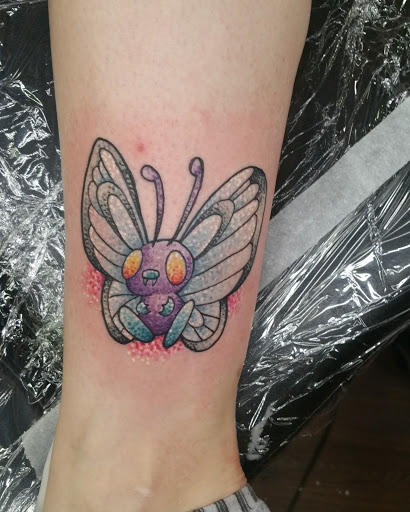 Explore tattoo ideas on ribs for guys, creative tattoo ideas in Fort Smith, available at Hanging City Body Modification