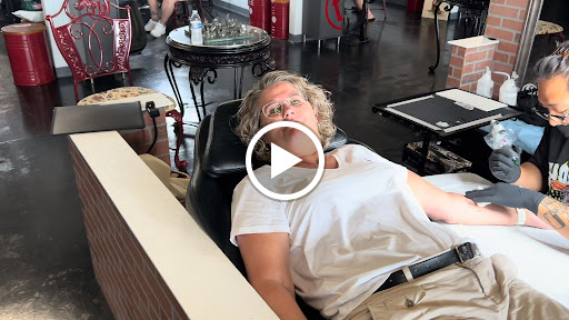 Explore rock and roll tattoo ideas, creative tattoo ideas in Kissimmee, available at Fallen Heroes Tattoo & Piercing (Florida)