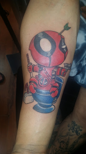 Tattoo Shop «Stained in pain tattoos», reviews and photos, 4211 N Milwaukee Ave, Chicago, IL 60641, USA