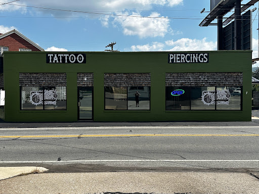 Explore tattoo ideas on the thigh, creative tattoo ideas in Altoona, available at Catharsis Tattoo Gallery