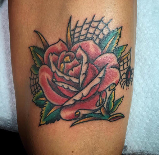 Explore tattoo cross ideas, creative tattoo ideas in Matthews, available at Divine Arts Tattoo Company